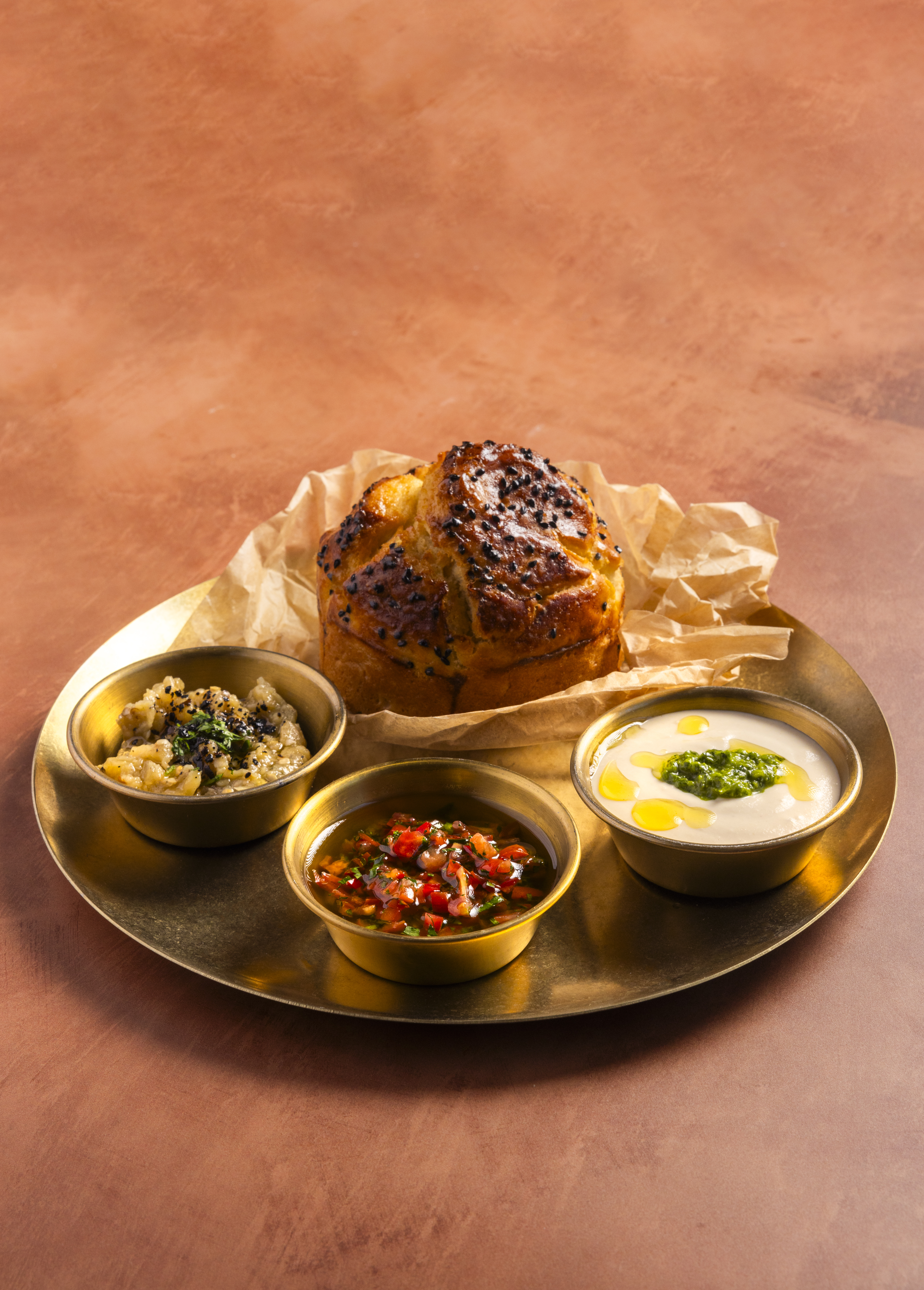 KUBANEH, TAHINI, ZHOUG, SALSA, SMOKED AUBERGINE Portrait